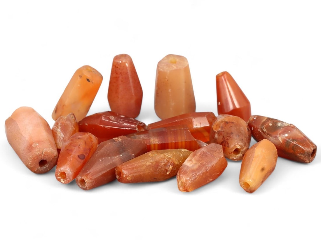 Antique African Tribal EdoCarved Carnelian Trade Beads: We are delighted to present an extraordinary collection of jewelry and artifacts spanning various historic European periods. Our selection ranges from Ancient Roman, Byzantine, and Early Medieval to L