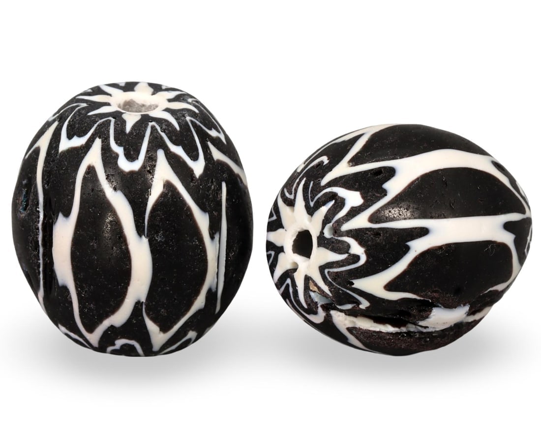 Lot of 2 Antique Venetian Chevron Glass Beads: We are delighted to present an extraordinary collection of jewelry and artifacts spanning various historic European periods. Our selection ranges from Ancient Roman, Byzantine, and Early Medieval to L