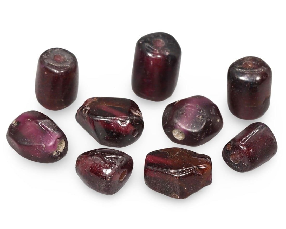Set of Ancient Egyptian Rough Shaped Garnet Pendant Beads, Roman Period 30 BC - 300 AD: We are delighted to present an extraordinary collection of jewelry and artifacts spanning various historic European periods. Our selection ranges from Ancient Roman, Byzantine, and Early Medieval to L