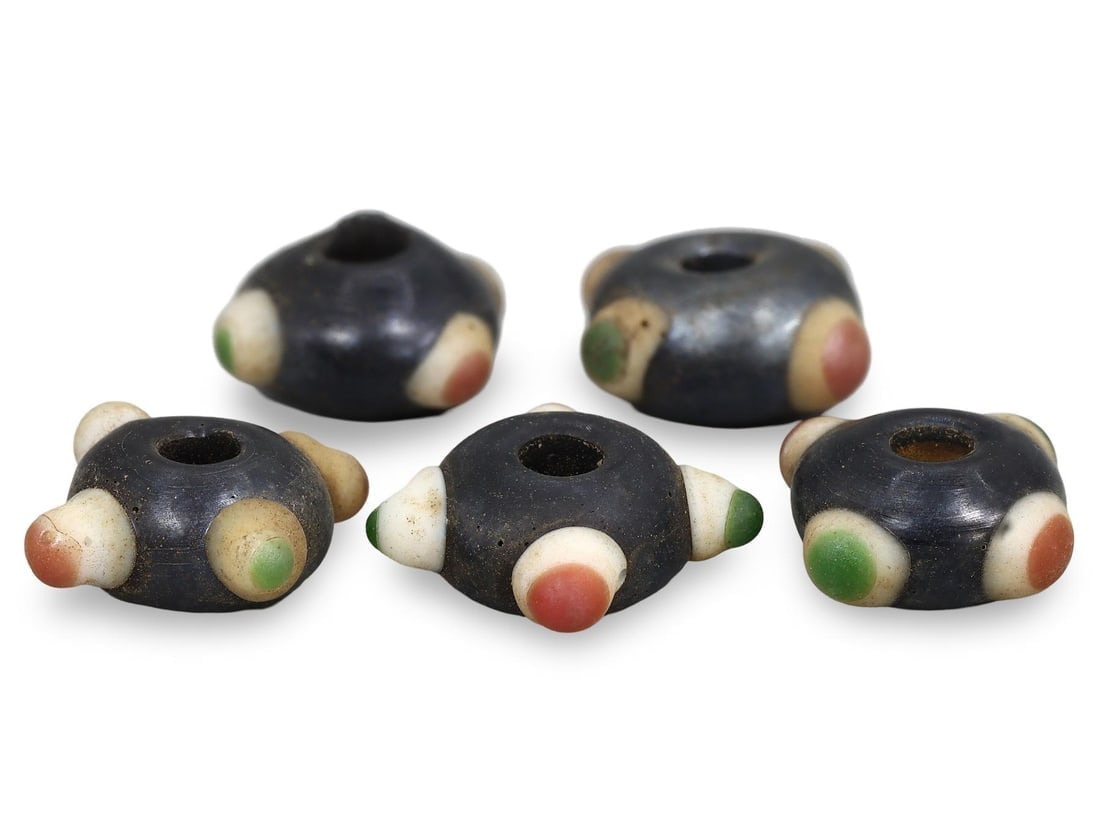 Ancient Carthaginian Stratified Knobbed Eye Glass Beads, 3rd-1st Century BC: We are delighted to present an extraordinary collection of jewelry and artifacts spanning various historic European periods. Our selection ranges from Ancient Roman, Byzantine, and Early Medieval to L