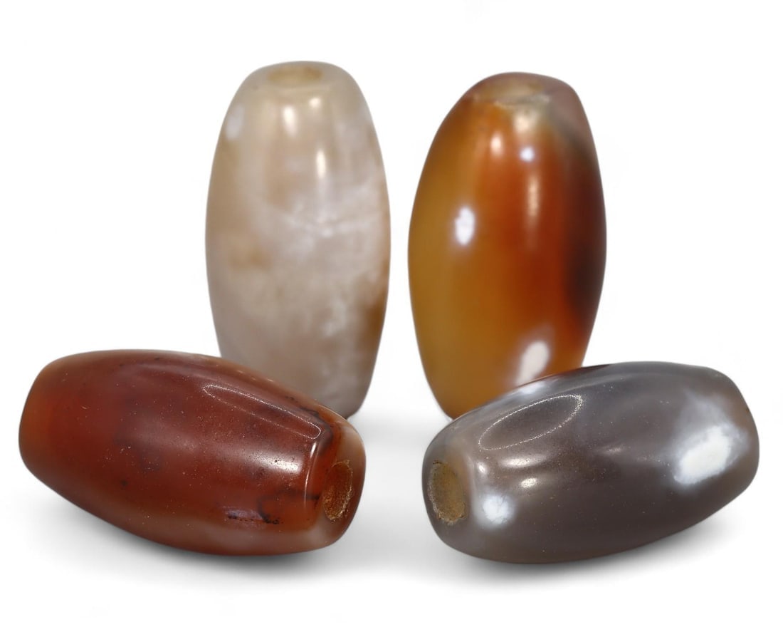 Antique Sino-Mongolian Honey Chalcedony Barrel Beads: We are delighted to present an extraordinary collection of jewelry and artifacts spanning various historic European periods. Our selection ranges from Ancient Roman, Byzantine, and Early Medieval to L