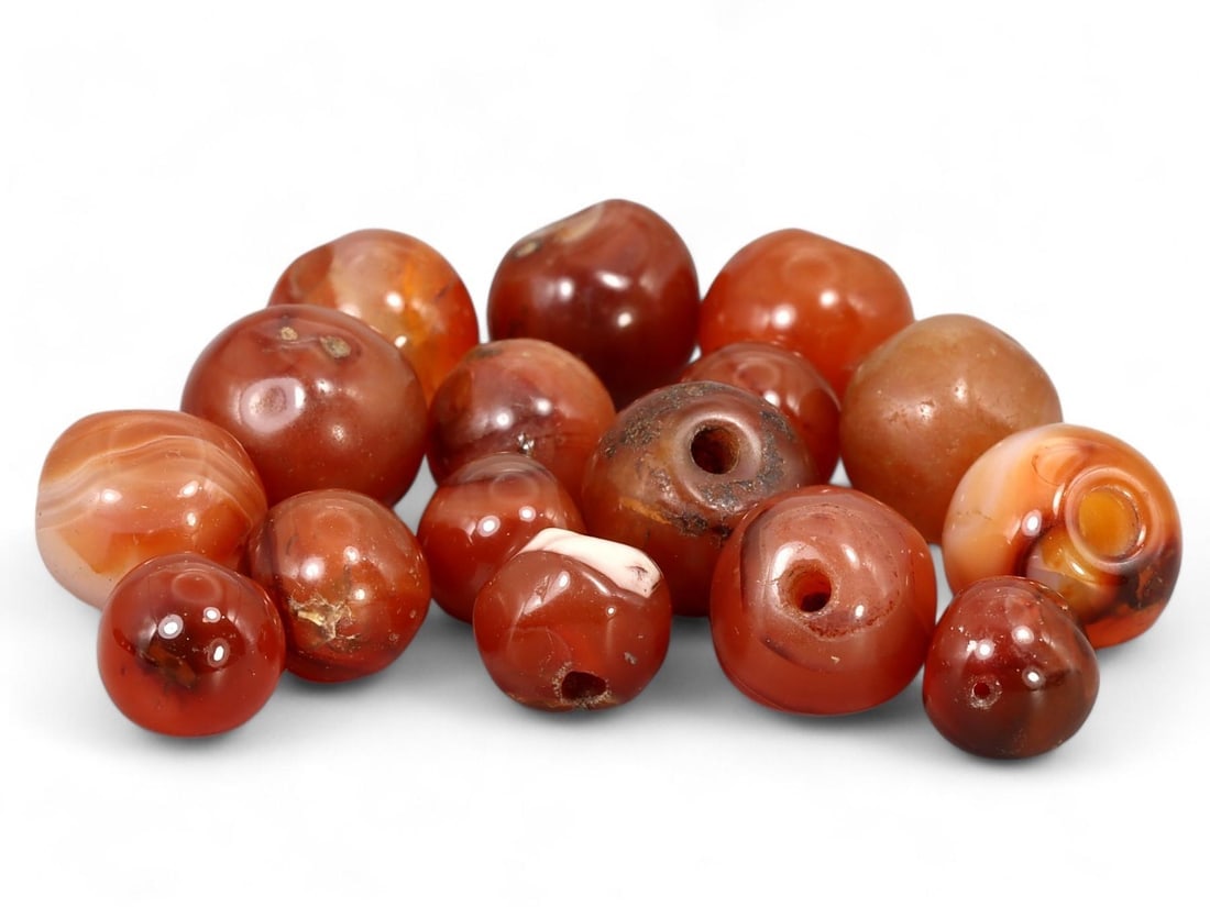Antique Sino-Mongolian Carnelian Beads: We are delighted to present an extraordinary collection of jewelry and artifacts spanning various historic European periods. Our selection ranges from Ancient Roman, Byzantine, and Early Medieval to L