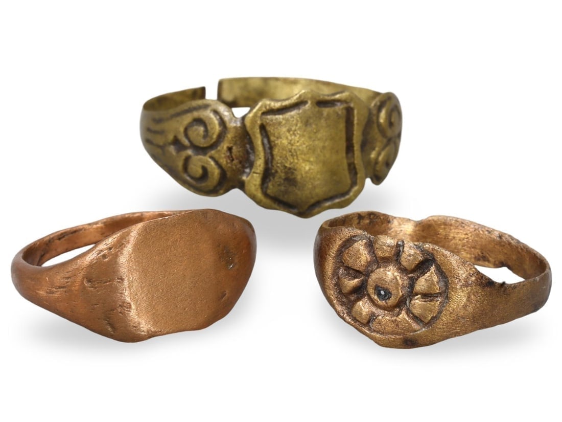 Collection of Three Ancient Medieval Bronze Rings with Shield and Floral Motifs (1 of 2)