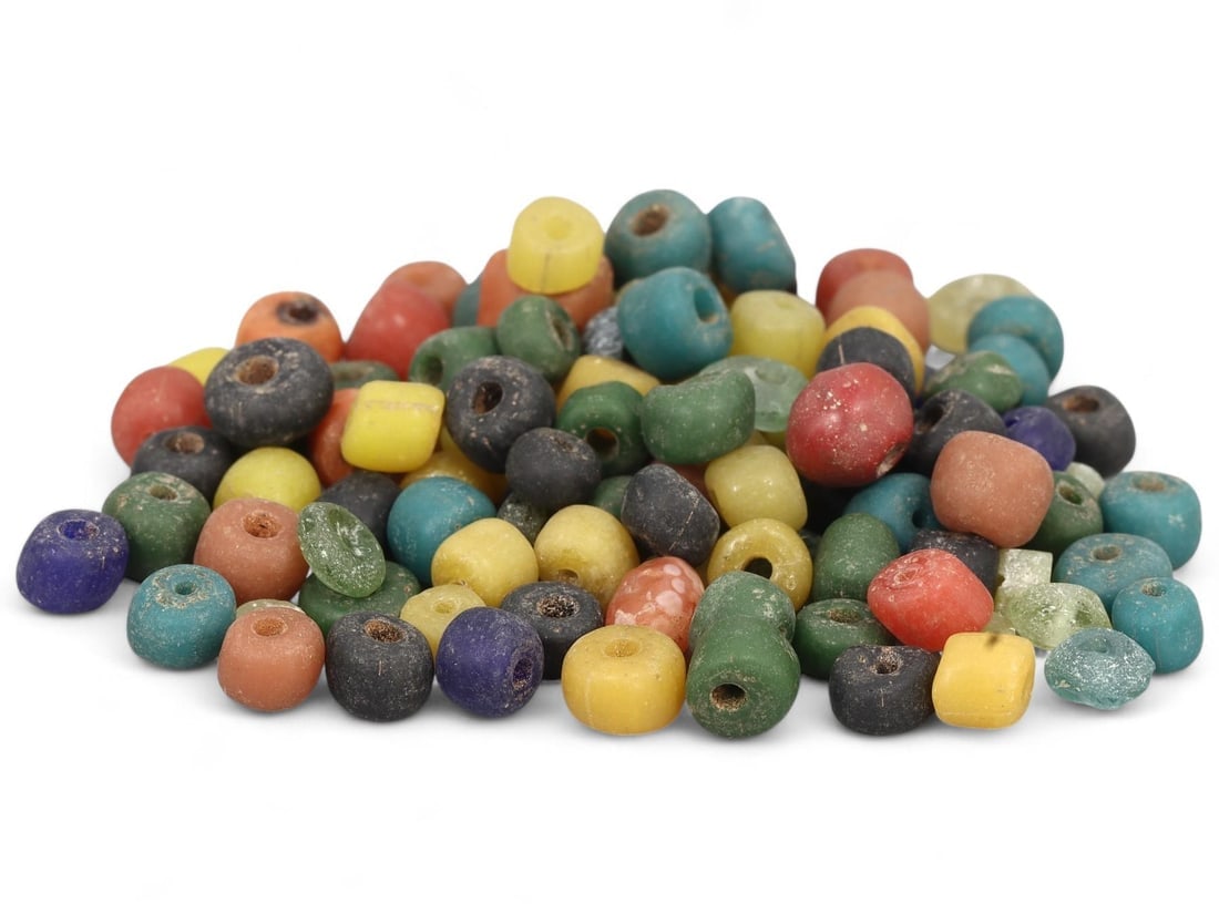 Lot of Antique Tribal African Monochrome Glass Beads: Are you searching to buy authentic ancient coins, medieval relics, or antique jewelry for sale? Look no further! Our upcoming auction features an exceptional collection of authentic ancient Roman coin