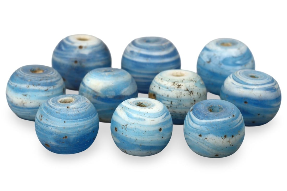 Antique Near Eastern Swirl Blue Glass Beads: NO RESERVE AUCTION running!! Our upcoming No Reserve Auction offers an incredible collection of authentic ancient Roman coins, Viking jewelry, and historical artifacts spanning millennia. This is a ra
