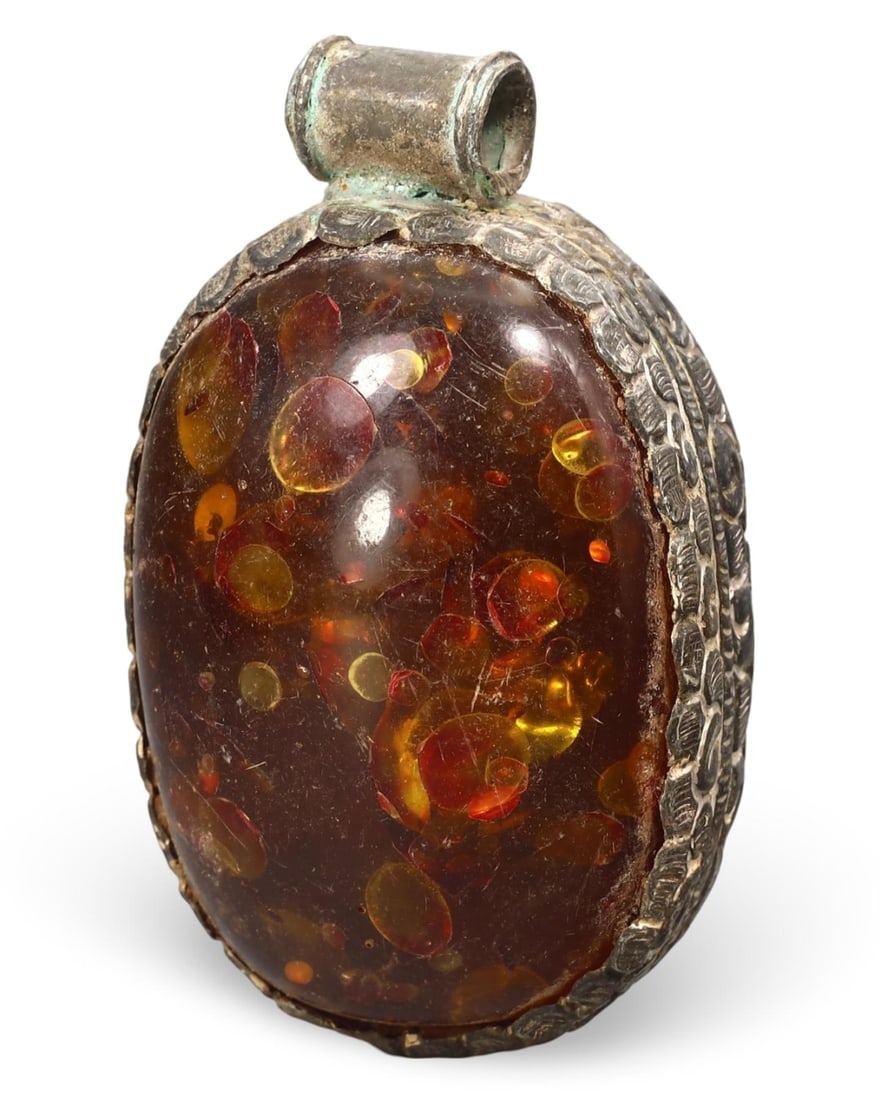 Post Medieval Sino Himalayan Tibetan Pressed Honey Amber Locket Pendant, 18th-20th Century: NO RESERVE AUCTION running!! Our upcoming No Reserve Auction offers an incredible collection of authentic ancient Roman coins, Viking jewelry, and historical artifacts spanning millennia. This is a ra