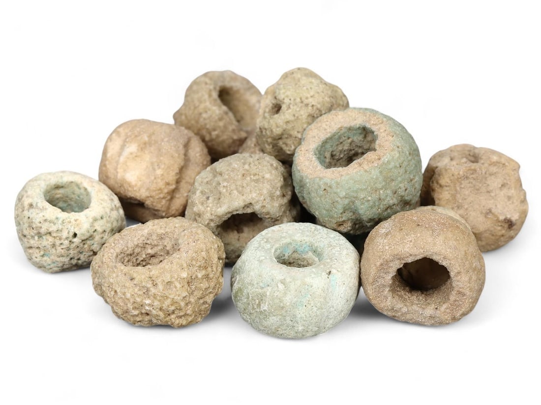 Ancient Egyptian Faience Melon-Seed Beads: Our highly anticipated Antique Auction, "Treasures of the Ancient and Medieval World," offering an unparalleled opportunity for collectors and history enthusiasts to acquire rare Ancient Artifacts for