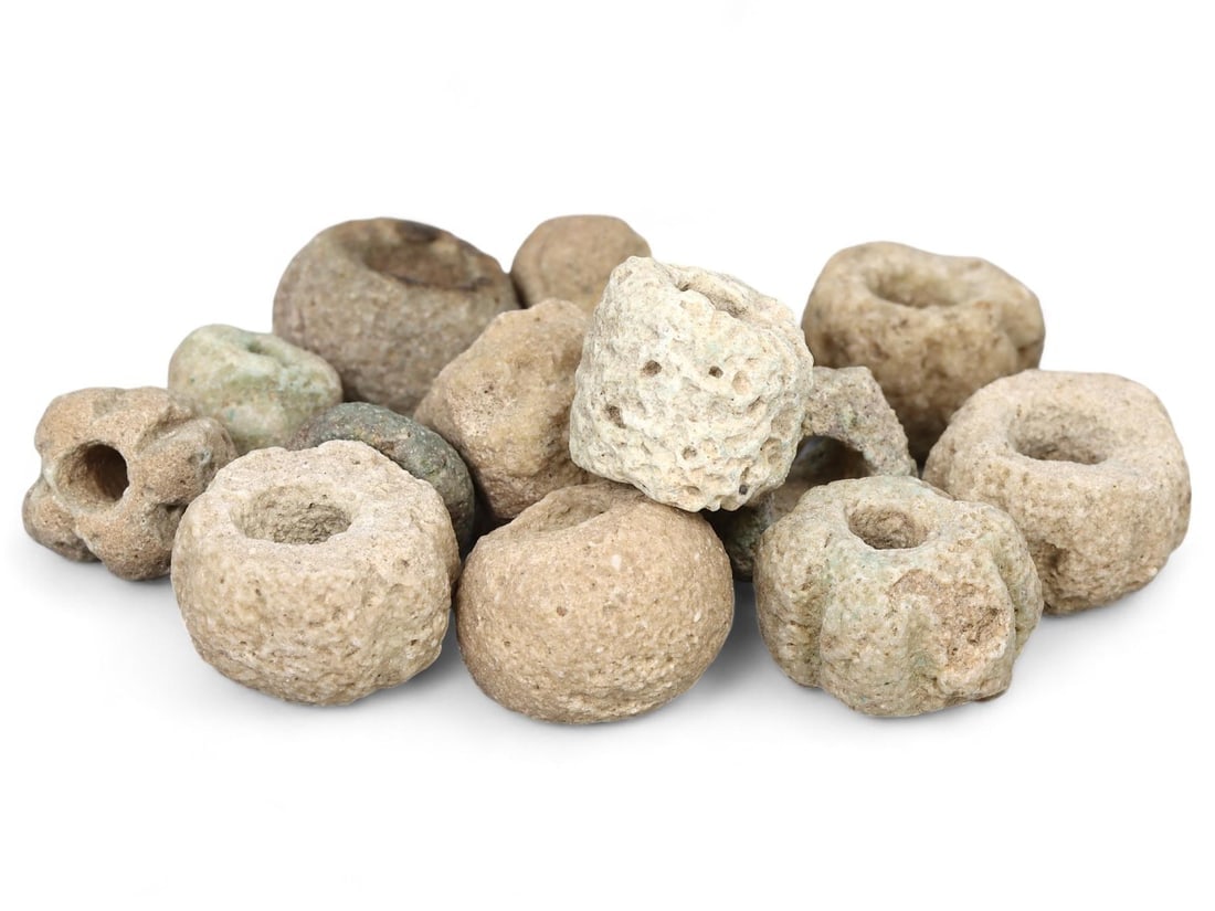 Ancient Egyptian Faience Melon-Seed Beads: Our highly anticipated Antique Auction, "Treasures of the Ancient and Medieval World," offering an unparalleled opportunity for collectors and history enthusiasts to acquire rare Ancient Artifacts for
