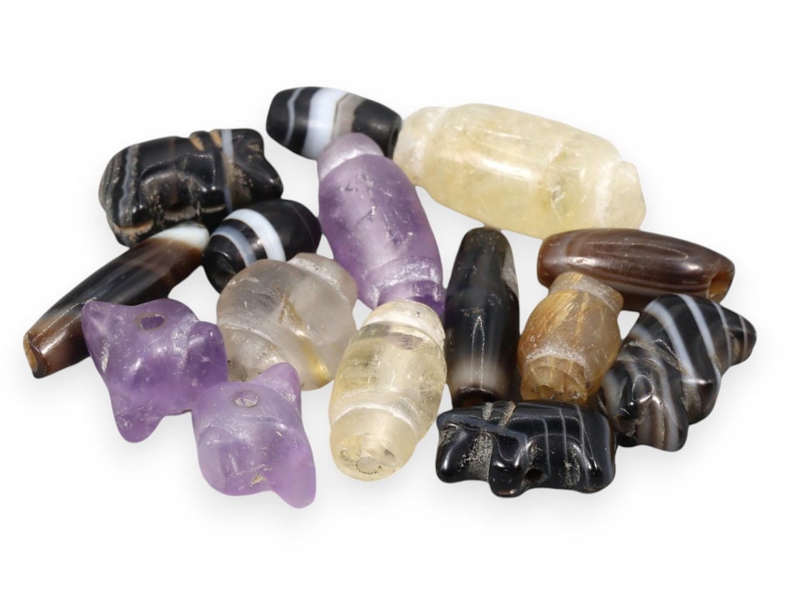 Ancient Amethyst and Banded Agate Beads with Zoomorphic Forms, Early Civilizations: Our highly anticipated Antique Auction, "Treasures of the Ancient and Medieval World," offering an unparalleled opportunity for collectors and history enthusiasts to acquire rare Ancient Artifacts for