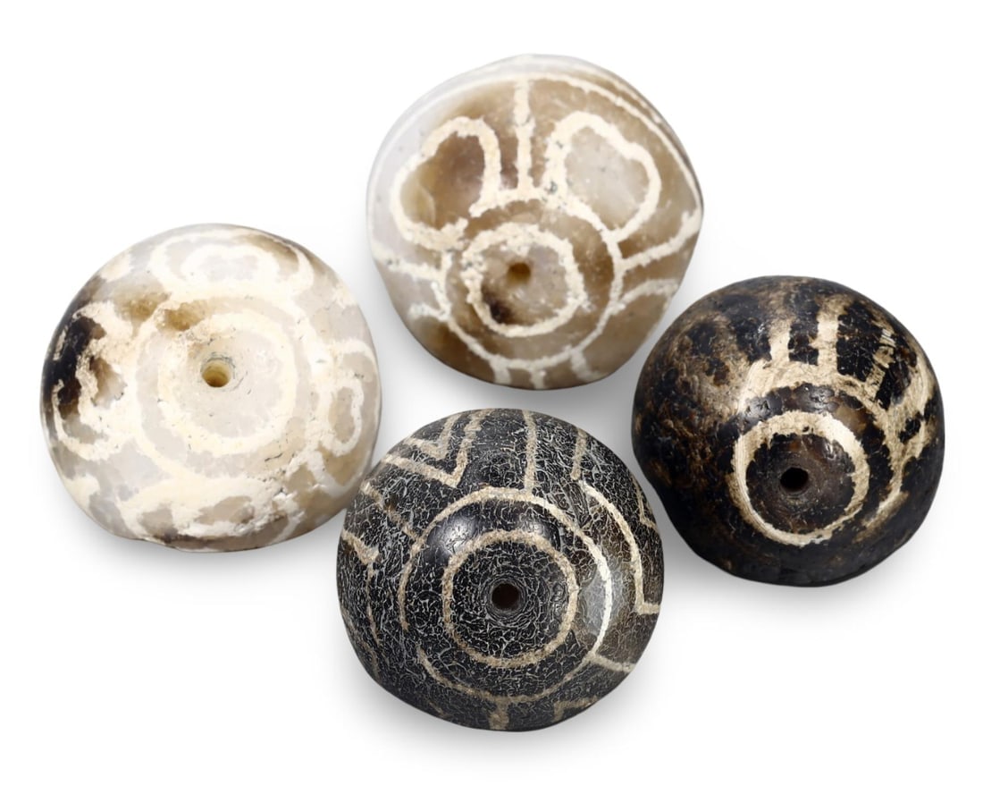 Ancient Himalayan Dzi Beads with Intricate Eye Patterns: Our highly anticipated Antique Auction, "Treasures of the Ancient and Medieval World," offering an unparalleled opportunity for collectors and history enthusiasts to acquire rare Ancient Artifacts for