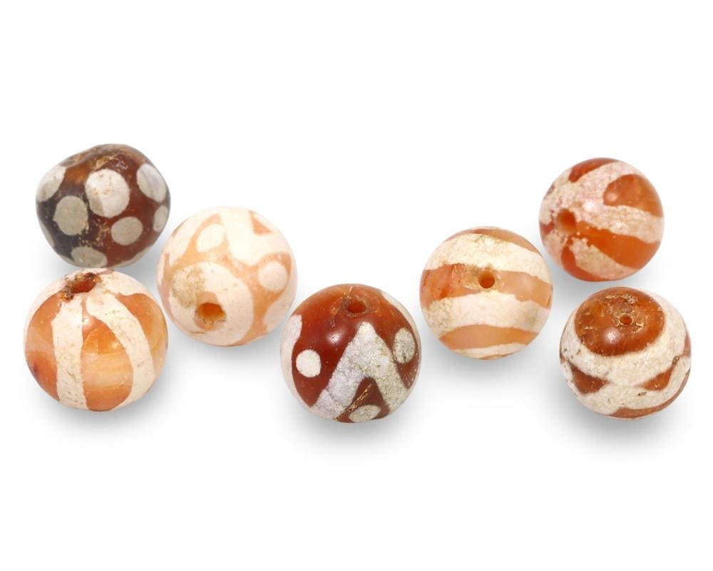 Lot of 7 Ancient Medieval Pagan Period Pyu Etched Carnelian Bead, 9th-13th Century: Our highly anticipated Antique Auction, "Treasures of the Ancient and Medieval World," offering an unparalleled opportunity for collectors and history enthusiasts to acquire rare Ancient Artifacts for
