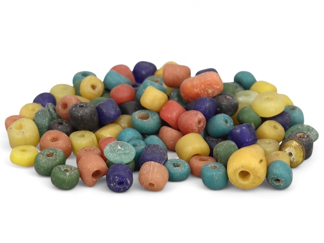 Lot of Antique Tribal African Monochrome Glass Beads: Our highly anticipated Antique Auction, "Treasures of the Ancient and Medieval World," offering an unparalleled opportunity for collectors and history enthusiasts to acquire rare Ancient Artifacts for