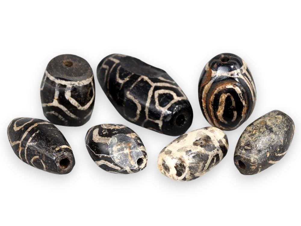Ancient Sino-Tibetan Carnelian Agate Beads with Intricate White Band Patterns: **Dimension information at the bottom section after Condition** Our highly anticipated Antique Auction, "Treasures of the Ancient and Medieval World," offering an unparalleled opportunity for collecto
