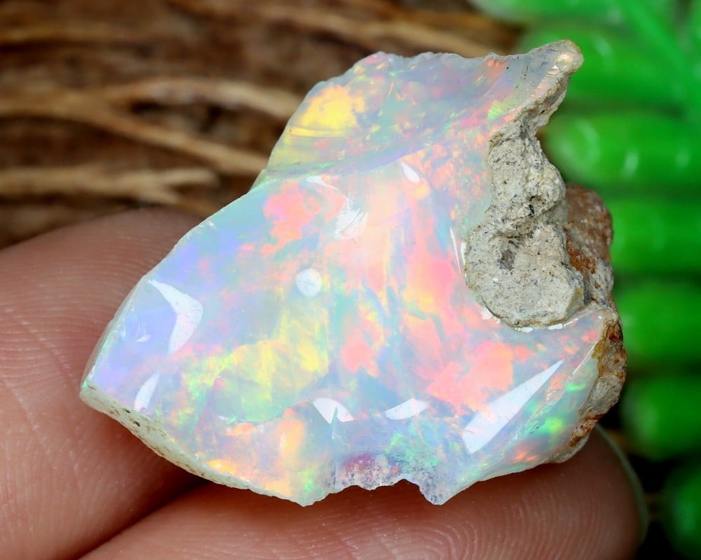 21.9Ct High Grade Ethiopian Welo Opal Rough Natural Gemstone with Bright Color Play: **Dimension information at the bottom section after Condition** Welcome to the No Reserve Ancient Relics & Rare Artifacts auction, where history comes alive through an extraordinary collection of trea