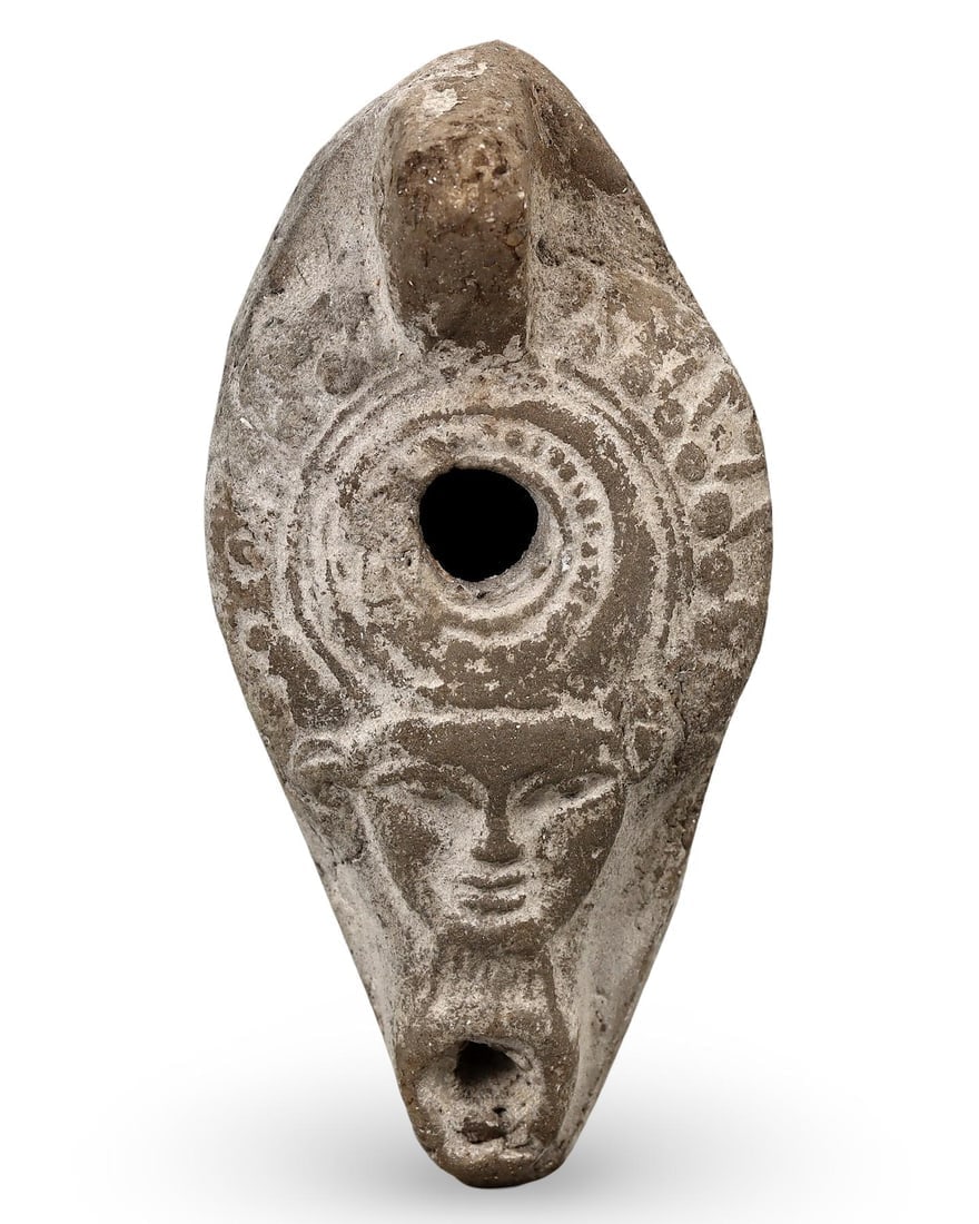 Post-Medieval Egyptian Grand Tour Clay Oil Lamp Featuring Hathor Face Design: **Dimension information at the bottom section after Condition** Welcome to the No Reserve Ancient Relics & Rare Artifacts auction, where history comes alive through an extraordinary collection of trea
