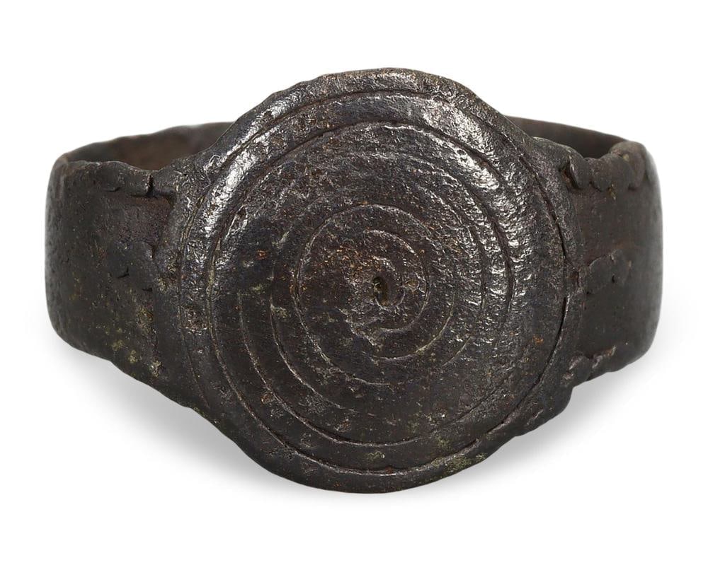 Early Medieval European Antique Bronze Ring with Spiral Motif: **Dimension information at the bottom section after Condition** Welcome to the No Reserve Antique Treasures Auction S2, where history comes alive through an extraordinary collection of treasures spann