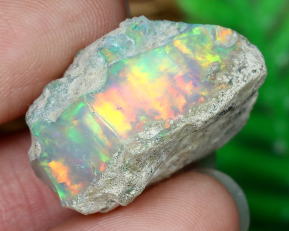 20.7Ct Natural Ethiopian Welo Opal Rough Facet Grade Gemstone with Play of Color: **Dimension information at the bottom section after Condition** Welcome to the No Reserve Antique Treasures Auction, where history comes alive through an extraordinary collection of treasures spanning