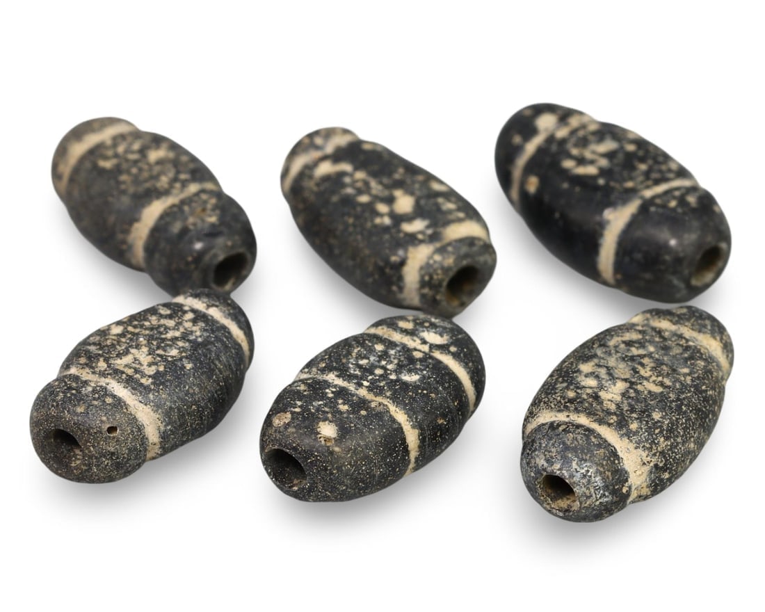 Ancient Romano-British Monochrome Collared Glass Beads: **Dimension information at the bottom section after Condition** Welcome to the No Reserve Antique Treasures Auction, where history comes alive through an extraordinary collection of treasures spanning