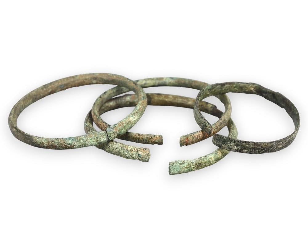 Group of Roman Bronze Cuff Bracelets Bearing the Marks of Antiquity: **Dimension information at the bottom section after Condition** Welcome to the No Reserve Antique Treasures Auction, where history comes alive through an extraordinary collection of treasures spanning