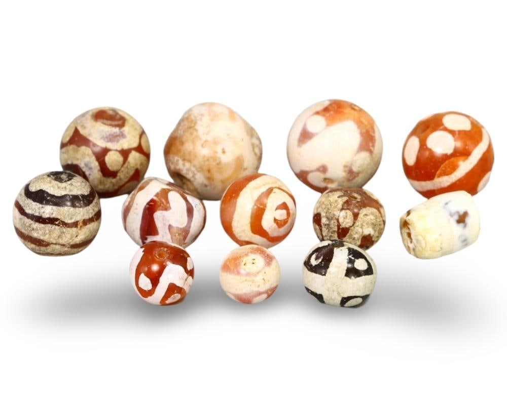 Tibeto-Burmese Carnelian Beads Hand-Etched Ancient Gemstone Jewelry: **Dimension information at the bottom section after Condition** Our highly anticipated Antique Auction, "Treasures of the Ancient and Medieval World," offering an unparalleled opportunity for collecto