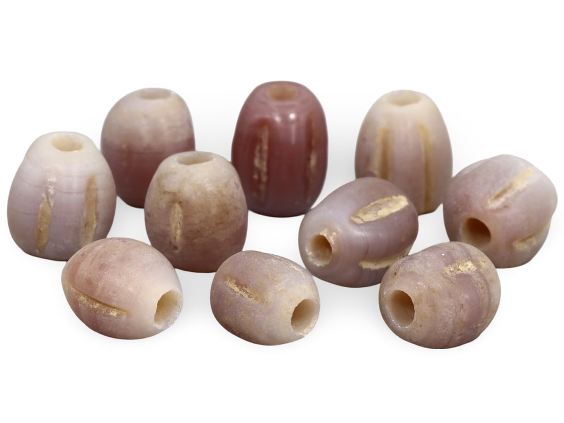 Ancient Medieval Anglo-Saxon Melon Seed Beads, 10th-11th Century: **Dimension information at the bottom section after Condition** Our highly anticipated Antique Auction, "Treasures of the Ancient and Medieval World," offering an unparalleled opportunity for collecto