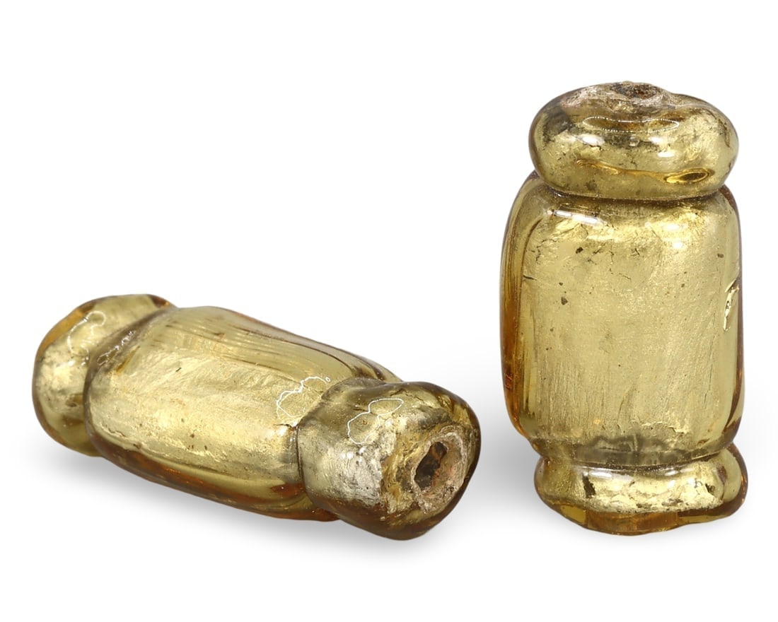 Ancient Roman Glass Beads in Golden Hues, 1st-3rd Century AD: **Dimension information at the bottom section after Condition** Our highly anticipated Antique Auction, "Treasures of the Ancient and Medieval World," offering an unparalleled opportunity for collecto