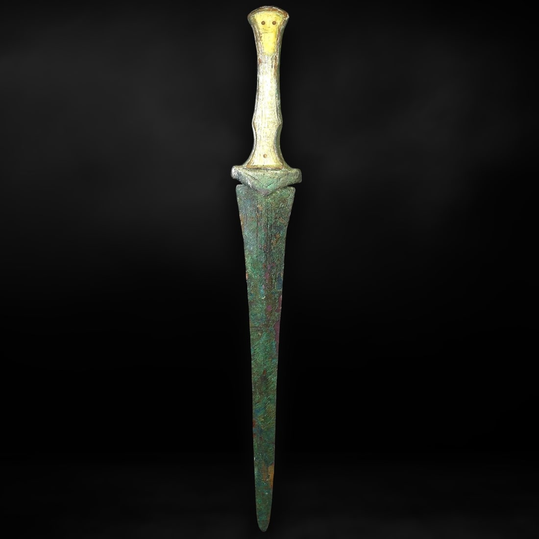 Exquisite Late Bronze Age Mycenaean Bronze Dagger with Bone Hilt, ca. 1400-1200 BCE: This extraordinary dagger originates from the Late Bronze Age Mycenaean civilization, circa 1400-1200 BCE, a culture celebrated for its martial prowess and refined craftsmanship. As an artifact of one