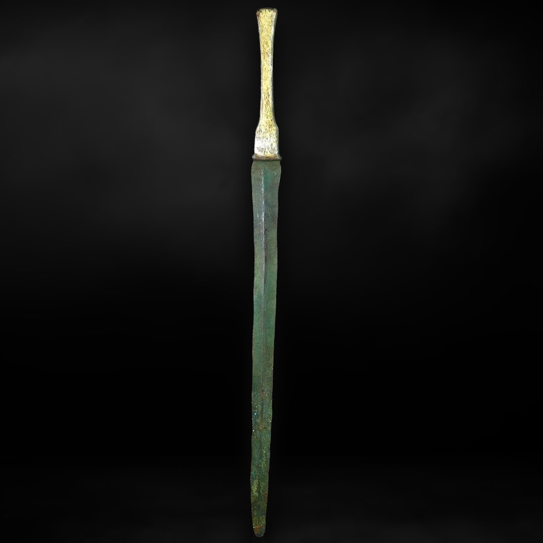 Ancient Luristan Bronze Sword with Bone-Inlaid Handle (c. 1200-800 BCE): This bronze sword hails from the Luristan culture of ancient Persia, an area renowned for its sophisticated metallurgy and artisanry during the early Iron Age (circa 1200-800 BCE). Luristan was a key
