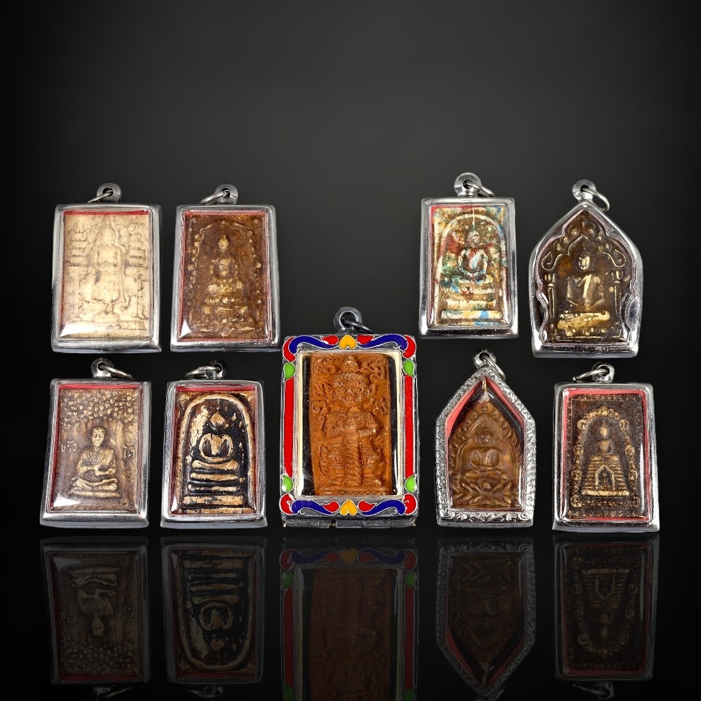 Set of 9 Framed Thai Buddhist Amulets with Vibrant Enamel and Silver Details (c. 19th-20th Century) (1 of 2)
