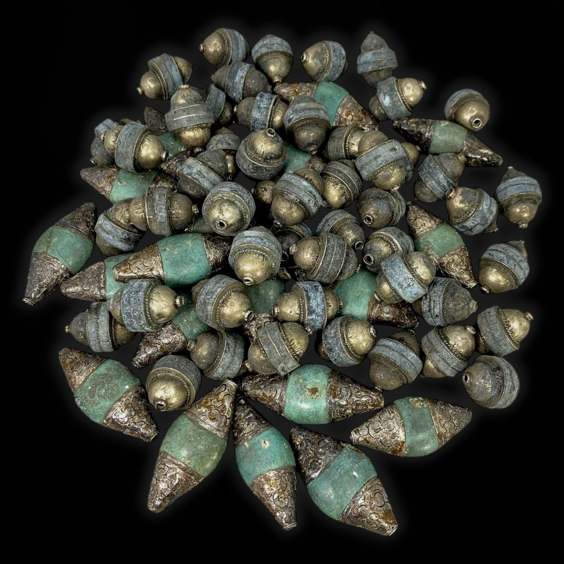 Antique Post Medieval Himalayan Spiritual Turquoise and Bronze Beads, 71 Pieces, c. 17th-18th: This exquisite set of 71 beads originates from the Post Medieval Himalayan region, crafted during the 17th-18th century CE. The Himalayan artisans of this era were known for their meticulous workmansh