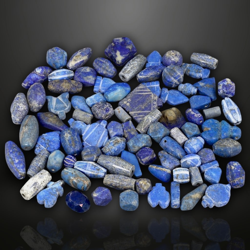 Medieval Lapis Lazuli Bead Collection, Rare Blue Hues, c. 12th-15th Century: This remarkable collection of medieval lapis lazuli beads, carefully crafted between the 12th and 15th centuries, offers an authentic connection to an era where lapis lazuli was treasured as a symbol 