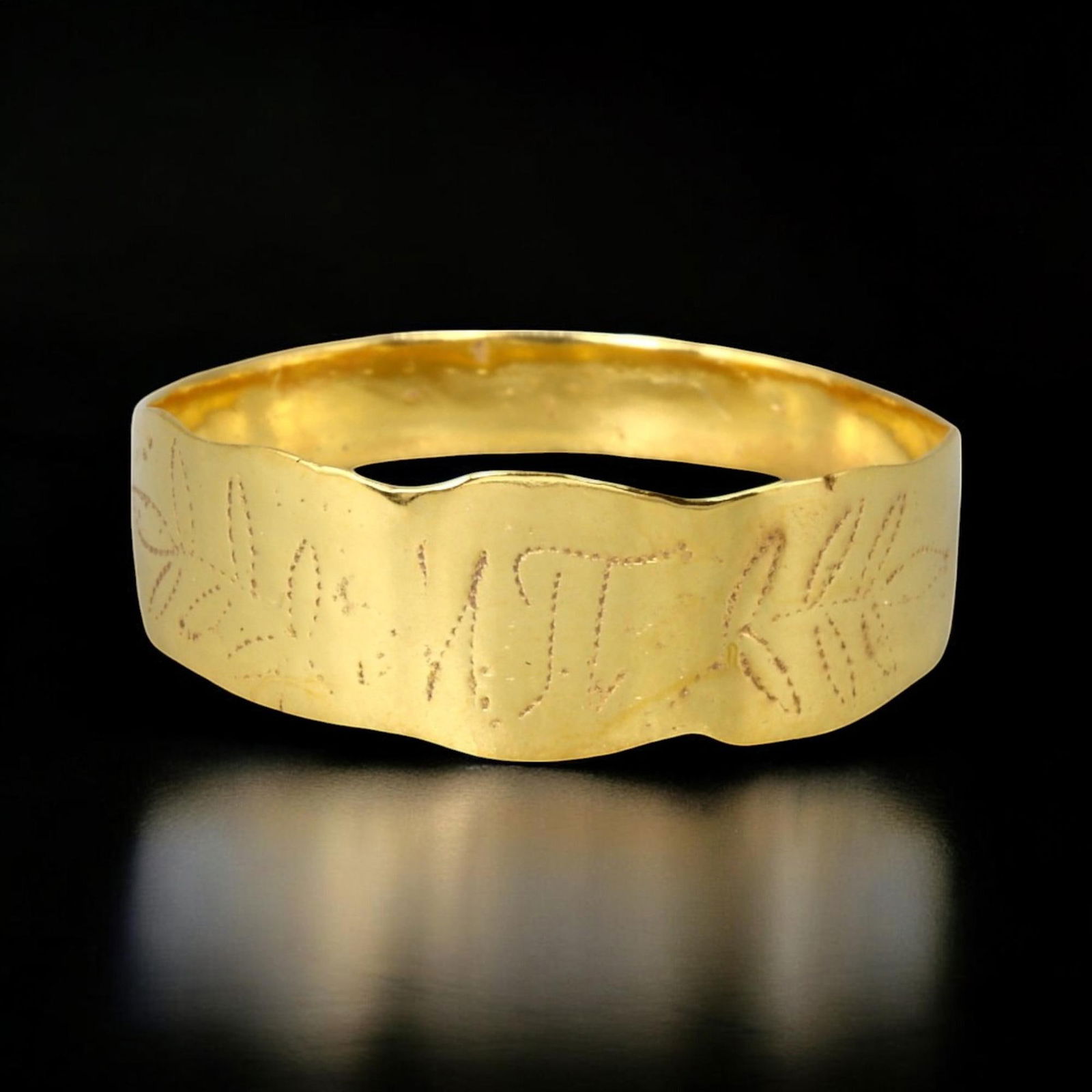 POST-MEDIEVAL PERIOD: Gilt Bronze Ring with Engraved Motifs, 17th-18th Century (1 of 2)