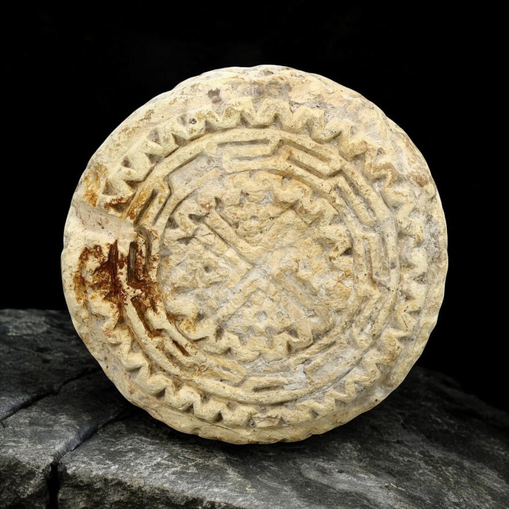 BYZANTINE EMPIRE: Ancient Pottery Moulded Stamp with Cross Motif, 5th-7th Century CE: This remarkable pottery stamp from the Byzantine period features a central cross motif surrounded by intricate, concentric decorative patterns. Measuring 12.5 cm in diameter and weighing 474 grams, th