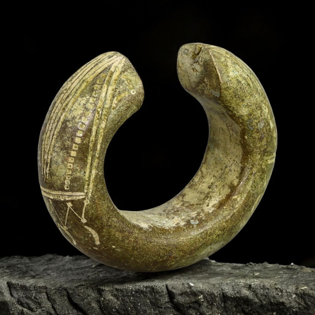 NGELIMA BRONZE CURRENCY PIECE: 18th Century: This fascinating bronze currency piece, attributed to the Ngelima people of Central Africa, dates to the 18th century. Measuring 5.5 cm in diameter, 3 cm in width, and weighing 126 grams, it boasts a 