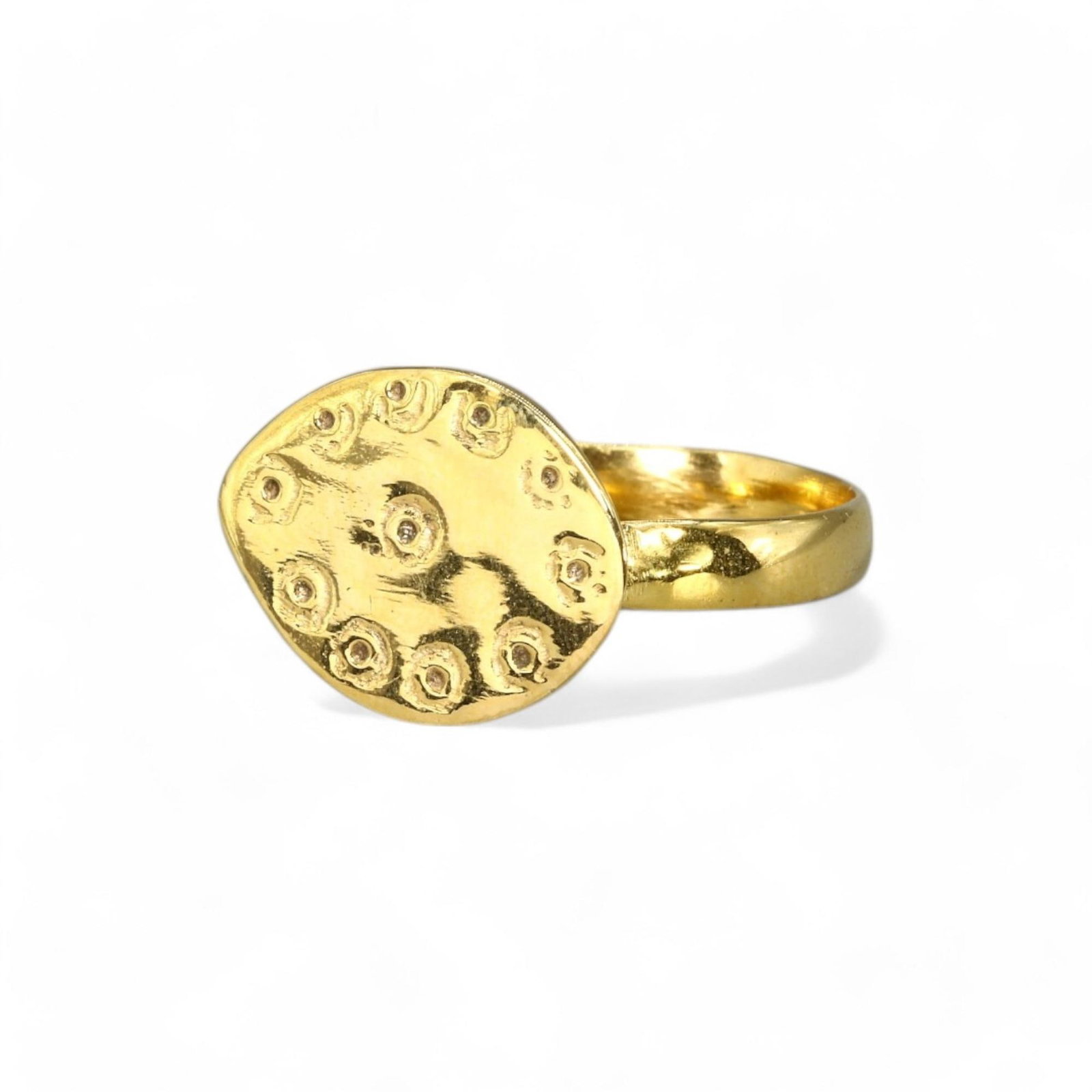 BYZANTINE EMPIRE: Gold-Gilt Bronze Signet Ring with Swirl Motif, 6th-9th Century CE (2.6g, Size 8): This exquisite Byzantine-era gold-gilt bronze signet ring boasts an oval bezel adorned with a swirling rosette motif encircled by concentric details. Such designs were emblematic of the Byzantine aris