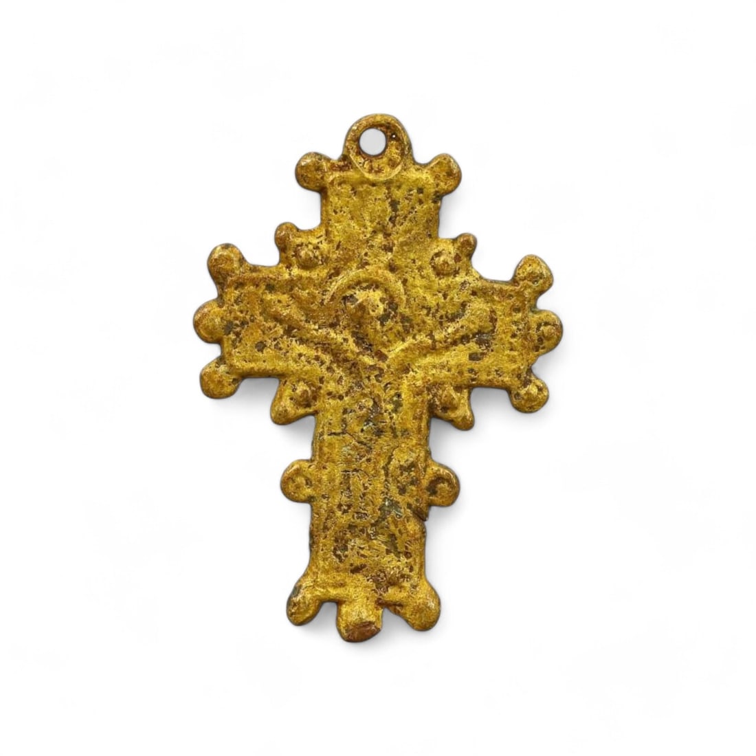 BYZANTINE ERA: Gold-Gilt Bronze Cross Pendant, 3g, 3.3cm: This delicate Byzantine cross pendant, weighing 3g and measuring 3.3cm in height, is crafted in bronze with a gold-gilt finish. The cross features an ornate, scalloped design with a central depiction 