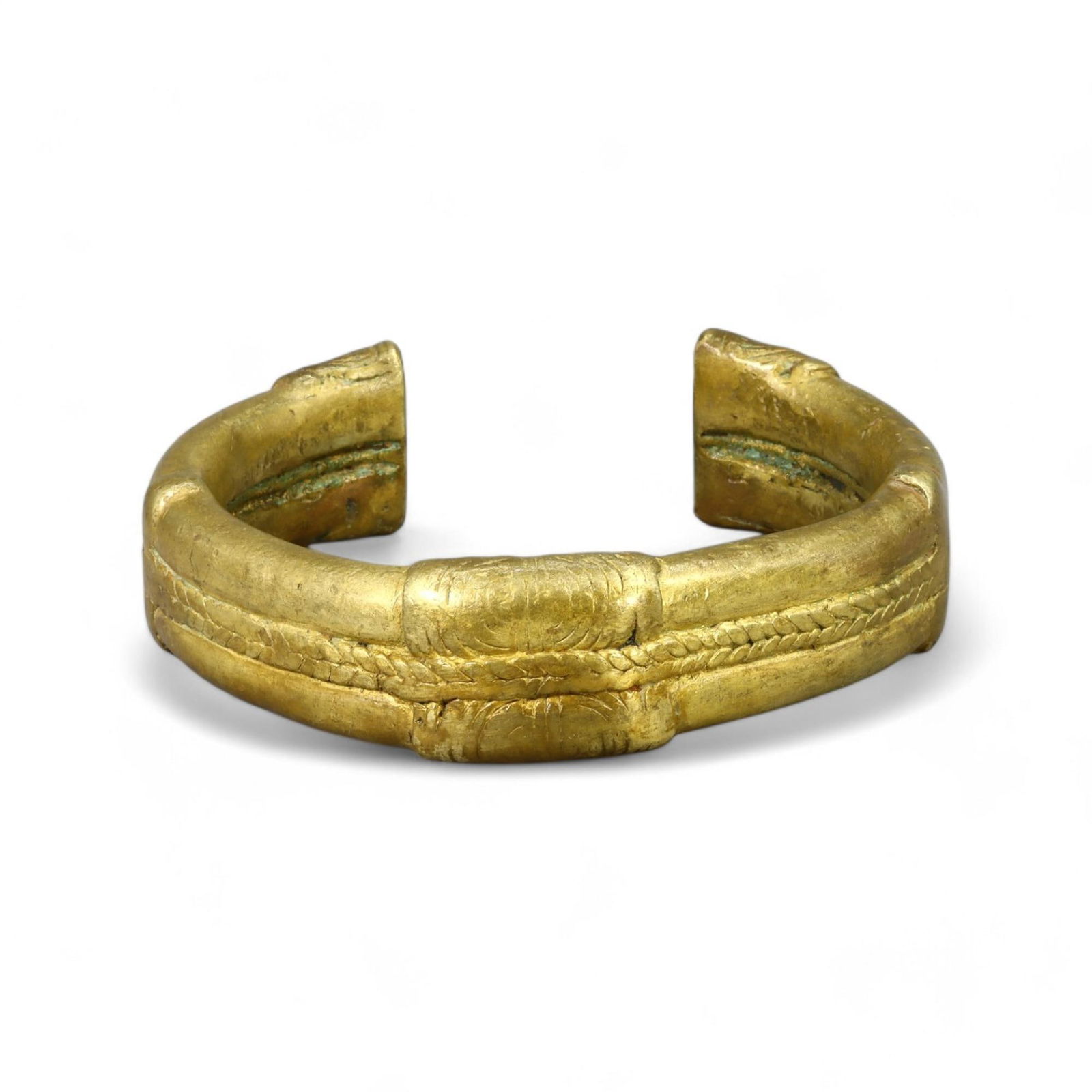 LURISTAN GOLD-GILT BRONZE CURRENCY ARMLET, ANCIENT IRAN, 1ST MILLENNIUM BCE (267g, 2x9cm): This exquisite Luristan gold-gilt bronze currency armlet, weighing 267 grams and measuring 2 cm in thickness and 9 cm in diameter, is a striking example of ancient craftsmanship from the 1st millenniu