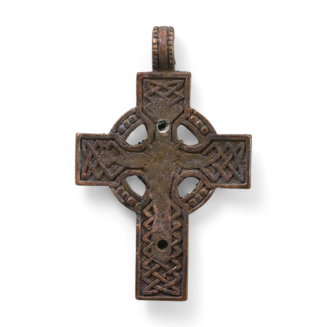 CELTIC-STYLE: Bronze Crucifix Pendant, CIRCA 10TH-12TH CENTURY CE (12g, 5.5x3.5 cm): This stunning bronze crucifix pendant exemplifies early medieval Celtic craftsmanship, featuring intricate knotwork patterns across its surface, evoking themes of eternity and divine unity. The centra