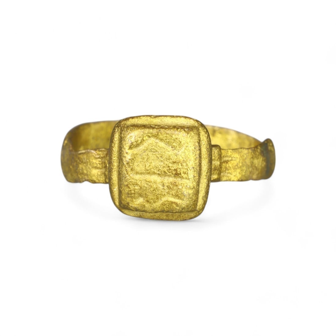 BYZANTINE: Gold-Gilt Bronze Ring with Square Bezel, 6th-9th Century CE (5g, US Size 10): This striking gold-gilt bronze ring, weighing 5g and sized at US 10, originates from the Byzantine period, circa 6th-9th century CE. The ring features a prominent square bezel with a gently textured s