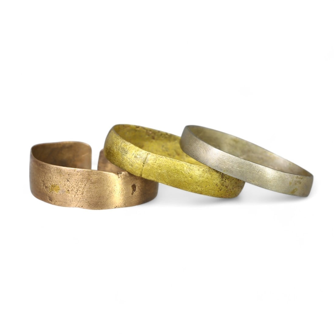VIKING: Lot of 3 Bronze Rings, 9th-11th Century CE (4g Total, US Sizes 8-10): This lot consists of three Viking bronze rings from the 9th-11th century CE, with a combined weight of 4g and sizes ranging from US 8 to 10. These minimalist rings exhibit smooth, undecorated bands, c