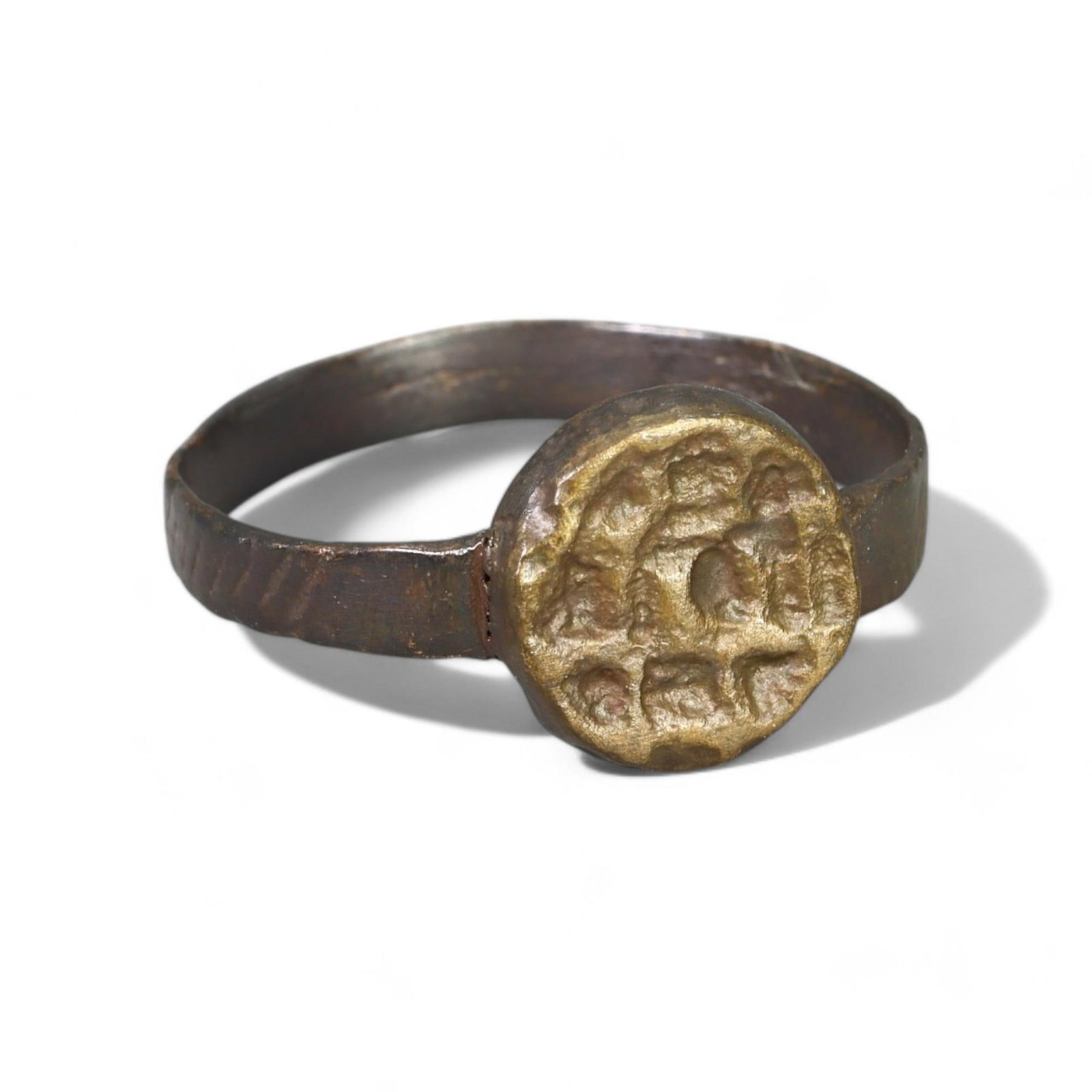 BYZANTINE ERA: Bronze "Embossed Circular Bezel" Ring, Circa 5th-7th Century CE (Size 10 US, 3g): This Byzantine-era bronze ring features a circular bezel adorned with an embossed motif, showcasing the characteristic artistic and functional craftsmanship of the period. The simple yet expressive de
