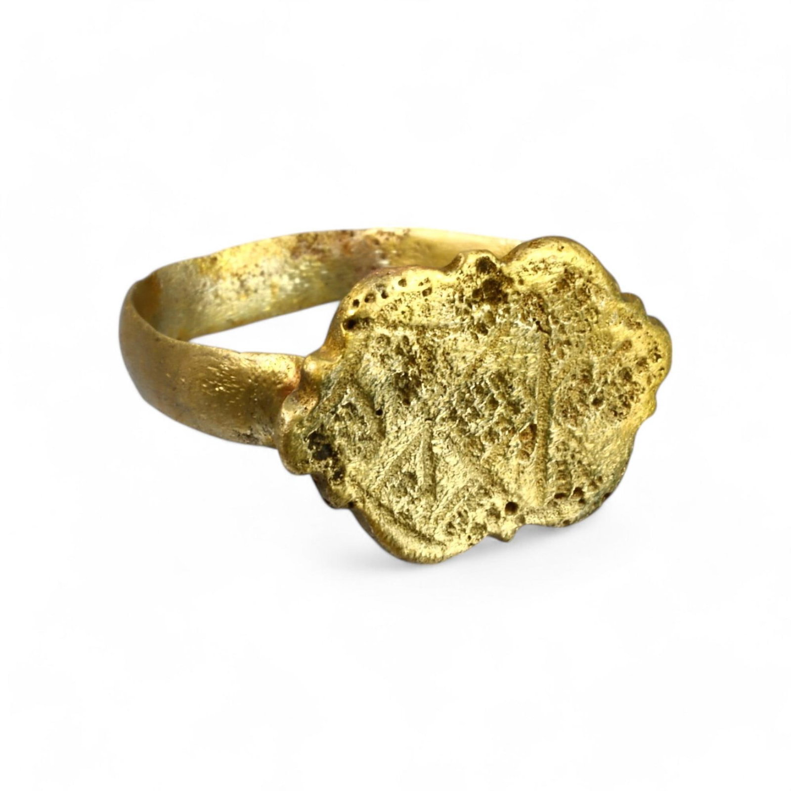 MEDIEVAL ERA: Gold-Gilt "Engraved Crest" Ring, Circa 12th-14th Century CE (Size 8 US, 4g): This elegant medieval-era ring features a scalloped oval bezel adorned with faint engraved patterns, overlaid with a luxurious gold gilt finish. The ornate design of the bezel and the fine craftsmansh