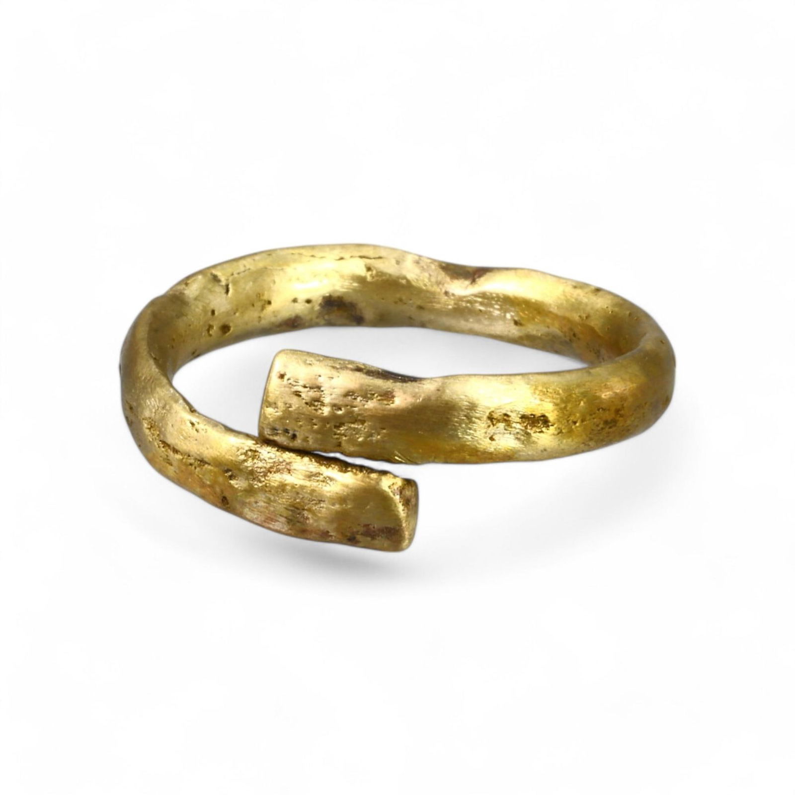 VIKING ERA: Gold-Gilt Bronze "Proto-Money" Ring, Circa 9th-11th Century CE (Size 8 US, 4g): This Viking-era bronze ring, featuring a simple yet practical wrap-around design, is gilded in gold, enhancing its visual appeal and highlighting its dual role as both adornment and currency. The ring