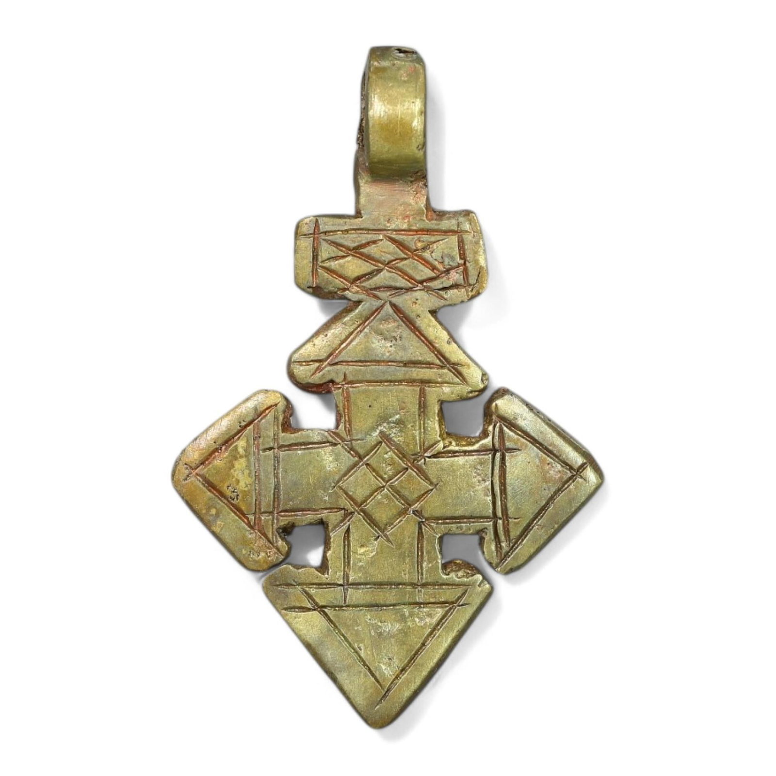 ETHIOPIAN COPTIC ERA: Gilded Bronze Cross Pendant, Circa 17th-19th Century CE 4x2.5cm, 10g): This exquisite Ethiopian Coptic cross pendant is crafted in gilded bronze, featuring intricate geometric engravings and small perforations that enhance its symbolic significance. The cross's symmetric