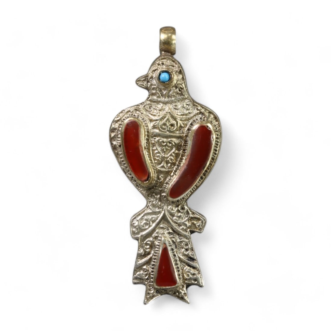 CENTRAL ASIAN: Silver "Bird of Vitality" Pendant, Carnelian Turquoise, 20th Century (26g, 7 x 3cm): This elegant Central Asian silver pendant, in the "Bird of Vitality" style, features a bird-shaped design intricately engraved with floral and geometric motifs. The pendant is adorned with vibrant car