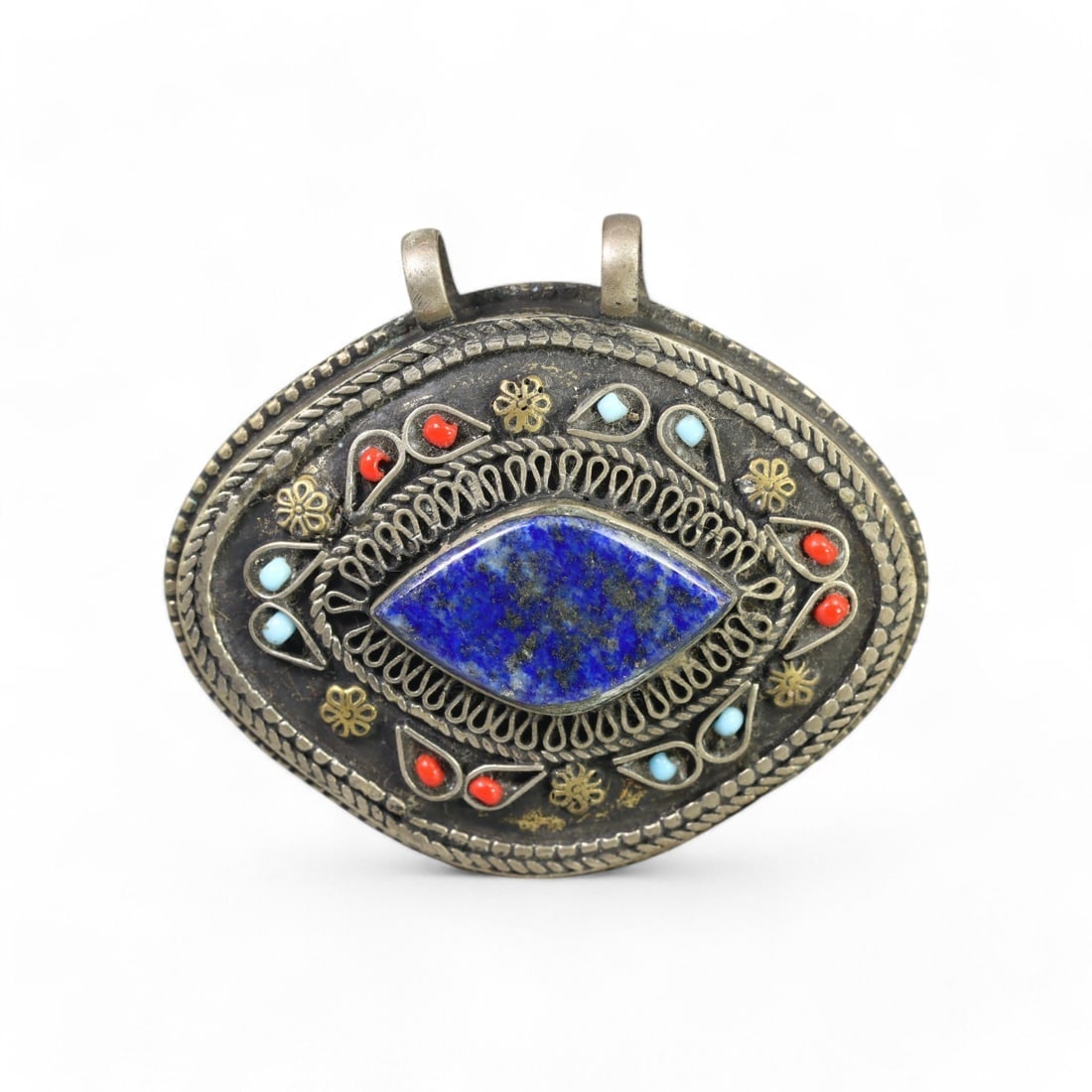CENTRAL ASIAN: Silver "Evil Eye Protector" Pendant with Lapis Lazuli, 20th Century (45g, 6.5cm): This remarkable Central Asian silver pendant features a striking marquise-shaped lapis lazuli centerpiece, surrounded by intricate filigree patterns and accented with vibrant coral and turquoise inlay