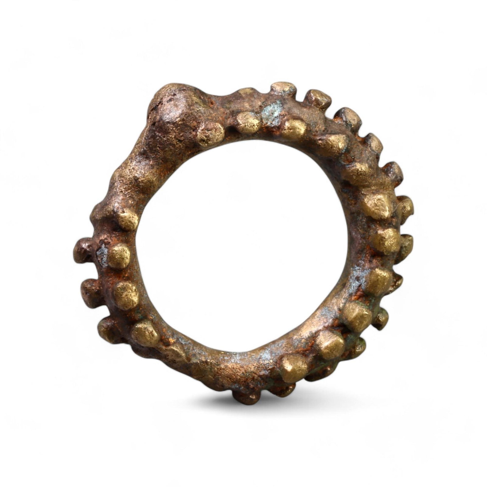 CELTIC PROTO-MONEY: Bronze Knobbed Ring, Circa 1st Millennium BCE (Size 6 US, 8g): This unique Celtic proto-money ring features a bold knobbed design around its circumference, emphasizing both its decorative and practical value. Weighing 8g, this bronze ring would have been used as 