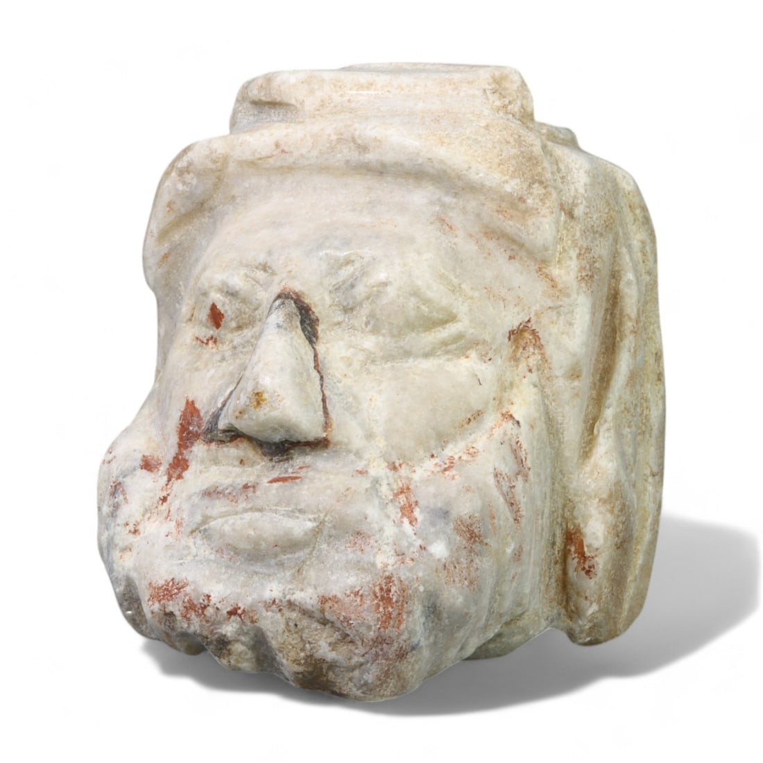 RENAISSANCE ERA: Marble Bust Fragment with Beard and Headwear, 15th-16th Century CE (653g, 8x7cm): This robust Renaissance-era marble bust fragment, weighing 653 grams and measuring 8x7 cm, depicts a bearded figure adorned with headwear, skillfully carved with expressive features. The intricate det