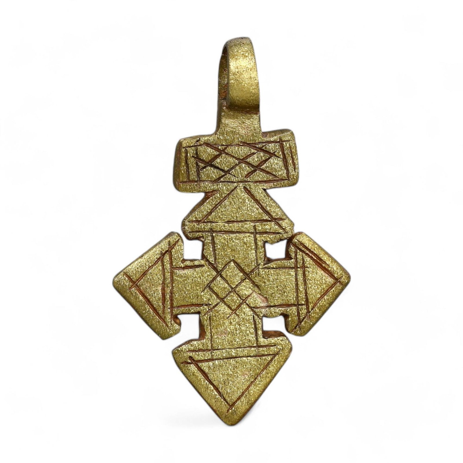 ETHIOPIAN COPTIC ERA: Gilded Bronze Cross Pendant, 17th-19th Century CE (9g, 4x2.5cm): This exquisite Ethiopian Coptic cross pendant is crafted in gilded bronze, featuring intricate geometric engravings and small perforations that enhance its symbolic significance. The cross's symmetric