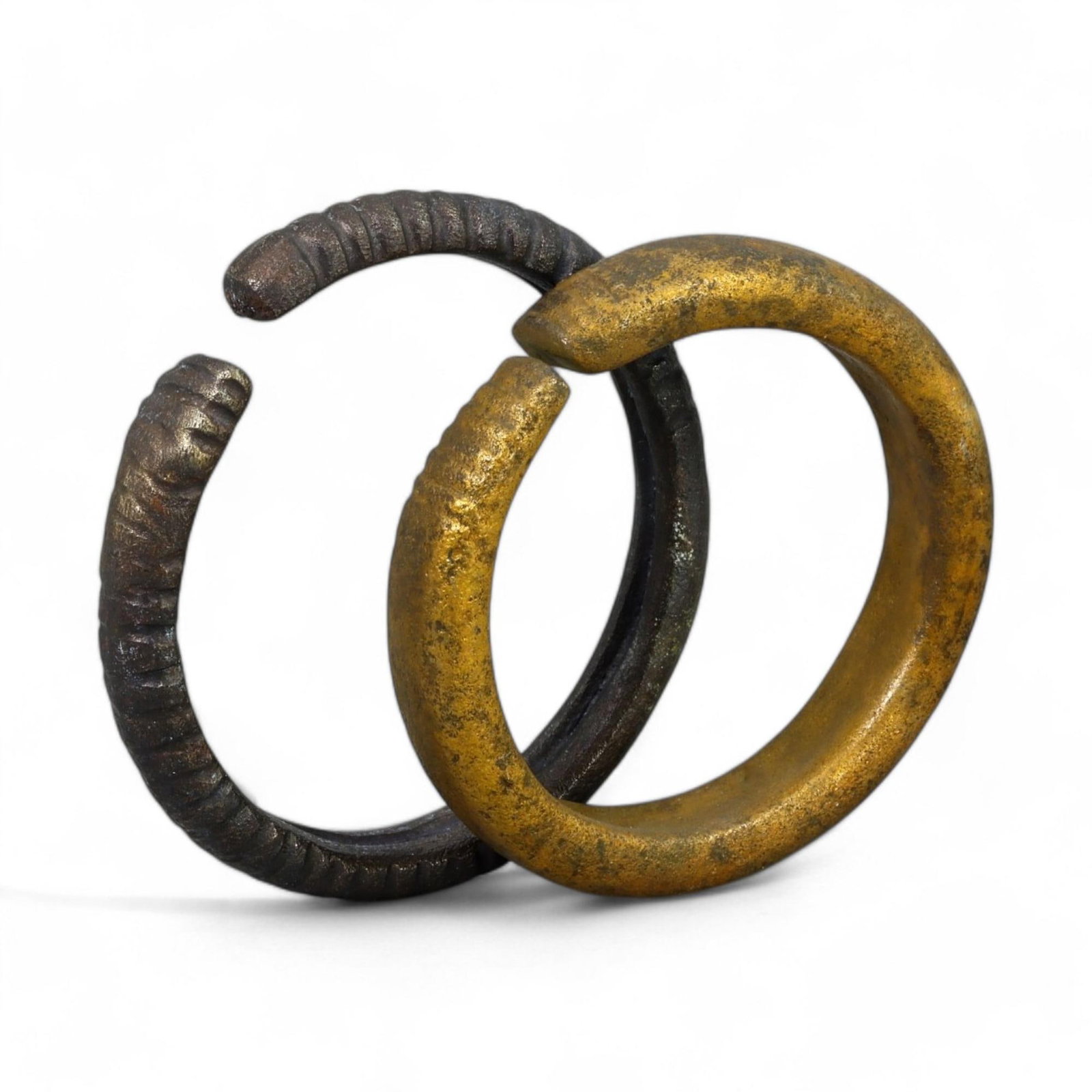 VIKING ERA: Bronze Proto-Money Rings, Circa 9th-11th Century CE (4.5 cm Diameter, 65g, Set of 2): This pair of Viking-era bronze proto-money rings exemplifies the dual function of early Norse currency as both a medium of exchange and a display of wealth. Weighing a combined 65g and measuring 4.5 c